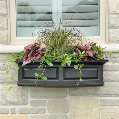 black wooden window boxes